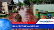 Air Berwarna Merah Merendam...
