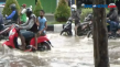 Terjangan Banjir Lumpuhkan...
