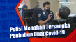 Polisi Menahan Tersangka...