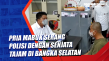 Pria Mabuk Serang Polisi...
