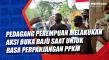 Pedagang Perempuan Melakukan...