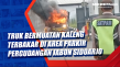 Sebuah Truk Bermuatan...