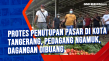 Protes Penutupan Pasar...