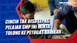 Cincin Tak Bisa Lepas,...