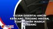 Hujan Disertai Angin...