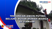 Terjangan Angin Puting...