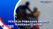 Pekerja Pemasang Baliho...