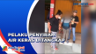 Pelaku Penyiraman Air...
