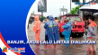 Banjir Menutup Jalan...