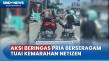 Pria Berbaju Loreng...