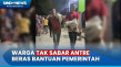 Warga Jarah Beras Bantuan...