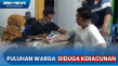 Puluhan Warga Diduga...