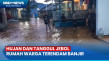 Hujan Deras dan Tanggul...