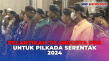 Tampil dengan Busana...