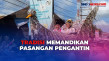 Melihat Tradisi Mandi...