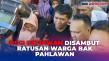 Ratusan Warga Sambut...