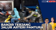 Banjir Terjang Jalan...