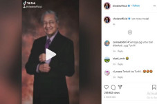 Unggah Video TikTok,...