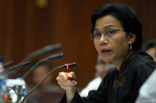 Sri Mulyani dan Komisi...
