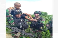 Bocah Asli Papua Ini...