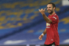 Man United Lolos Perempat...