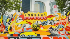 Merger dengan Indosat,...