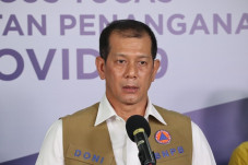 Setahun Pandemi Covid-19,...
