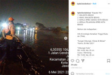 Banjir Akibat Tanggul...