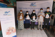 WOM Finance Gandeng...