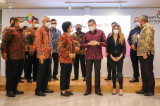 MNC Group-Telkom Resmi...