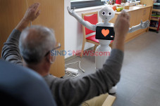Robot Bantu Rehabilitasi...