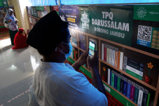 Menyambangi Perpustakaan...