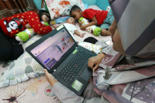 Komitmen AXA Mandiri...