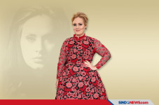 Adele Sukses Turunkan...