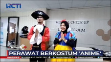 Perawat Gunakan Kostum...
