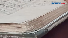Al-Quran Tulis dari...