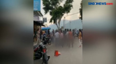Wisatawan dan Pemilik...