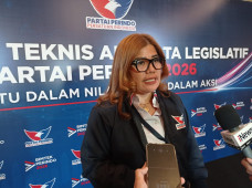 Herti Sastra Munthe...
