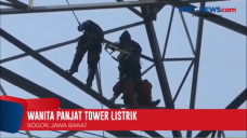 Wanita Panjat Tower...