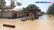 Tanggul Sungai Jebol,...