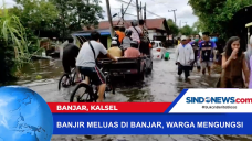 Banjir Kian Meluas di...