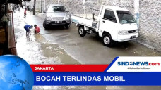 Bermain Genangan Air,...