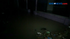 Banjir Hingga Dua Meter...