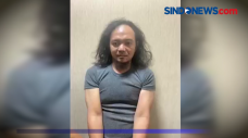 Kaki dan Tangan Diborgol,...