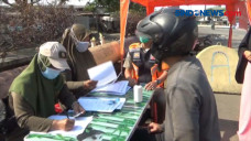 Razia Tertib Masker,...