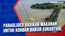 Paraglider Bagikan Makanan...