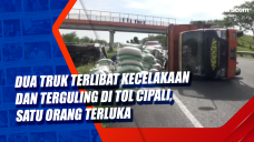 Dua Truk Terlibat Kecelakaan...
