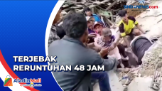 Bocah Terjebak Reruntuhan...