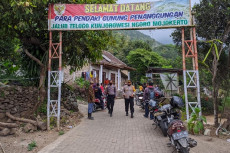 Diguyur Hujan, Dua Pendaki...