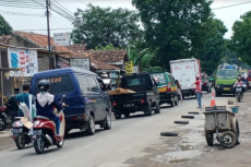 Perbaikan Jalan dari...